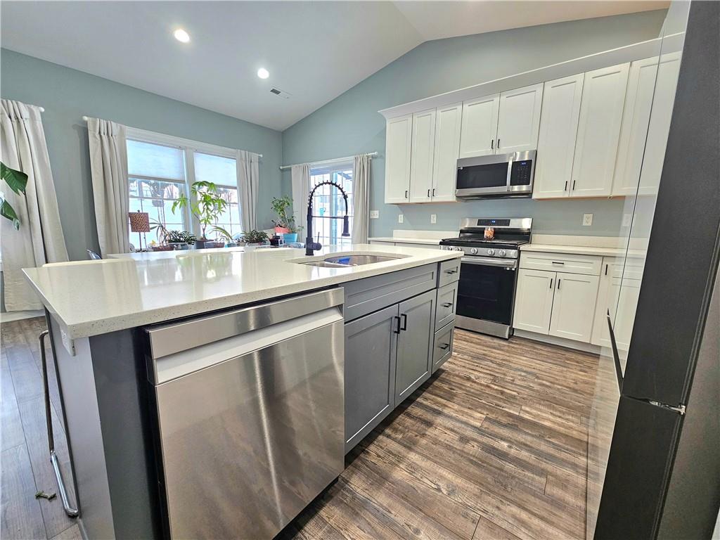300 7th Avenue New Eagle, PA 15067 - Photo 6 of 22 a kitchen with stainless steel appliances granite countertop a sink dishwasher stove and refrigerator