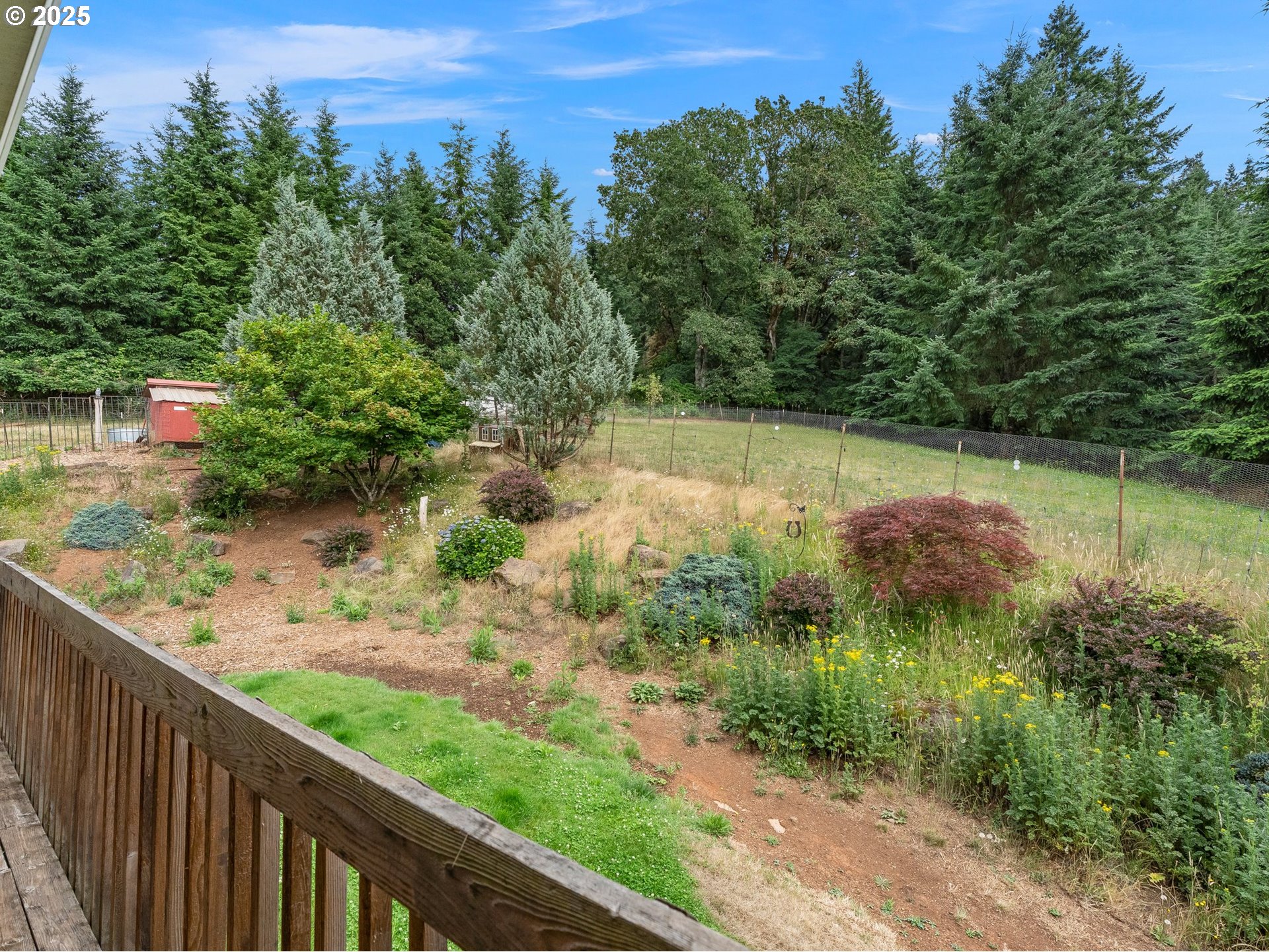 19791 Northeast Sunnycrest Road Newberg, OR 97132 - Photo 19 of 40 a view of a lake with a yard