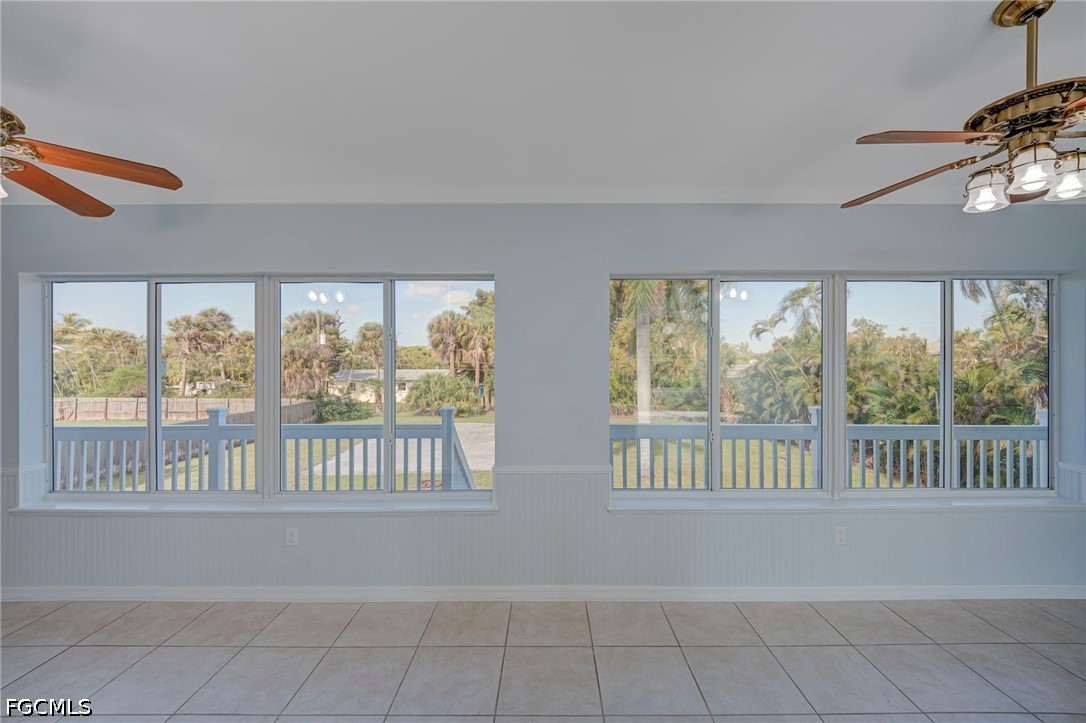16380 Arbor Ridge Drive Fort Myers, FL 33908 - Photo 18 of 47 a view of porch with a floor to ceiling window