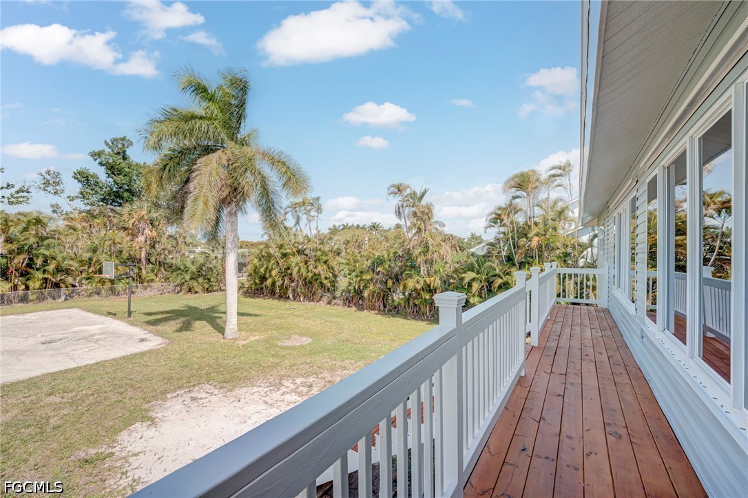 16380 Arbor Ridge Drive Fort Myers, FL 33908 - Photo 22 of 47 a view of a balcony with floor to ceiling windows