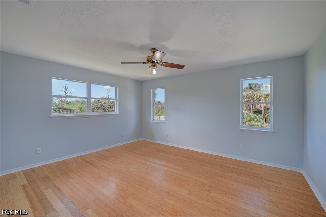 16380 Arbor Ridge Drive Fort Myers, FL 33908 - Photo 25 of 47 a view of an empty room with a window