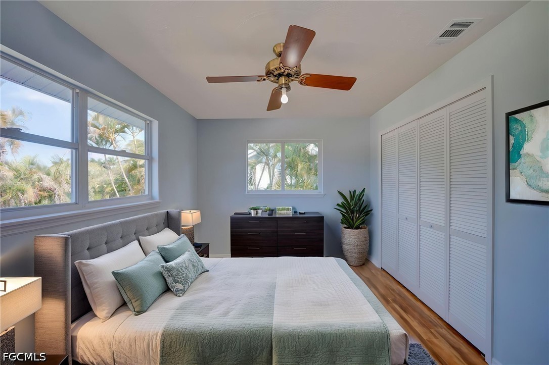 16380 Arbor Ridge Drive Fort Myers, FL 33908 - Photo 35 of 47 a bedroom with a large bed and a window