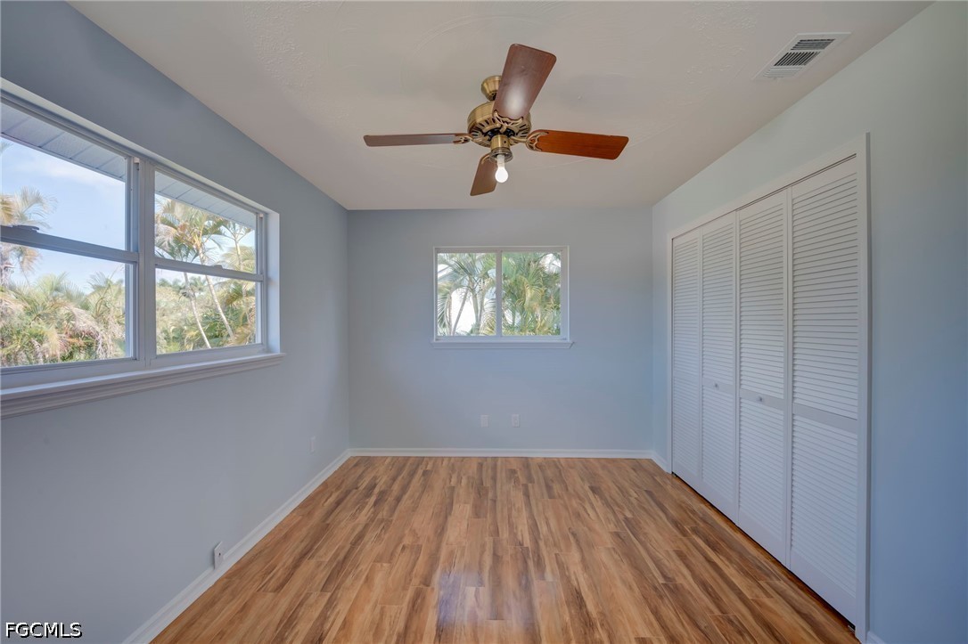 16380 Arbor Ridge Drive Fort Myers, FL 33908 - Photo 36 of 47 a view of empty room with wooden floor