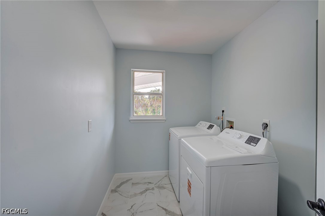 16380 Arbor Ridge Drive Fort Myers, FL 33908 - Photo 39 of 47 a utility room with dryer and washer