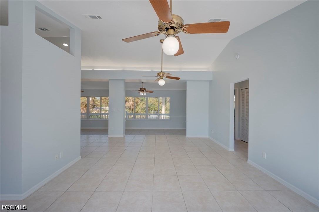 16380 Arbor Ridge Drive Fort Myers, FL 33908 - Photo 4 of 47 wooden floor in an empty room with a window