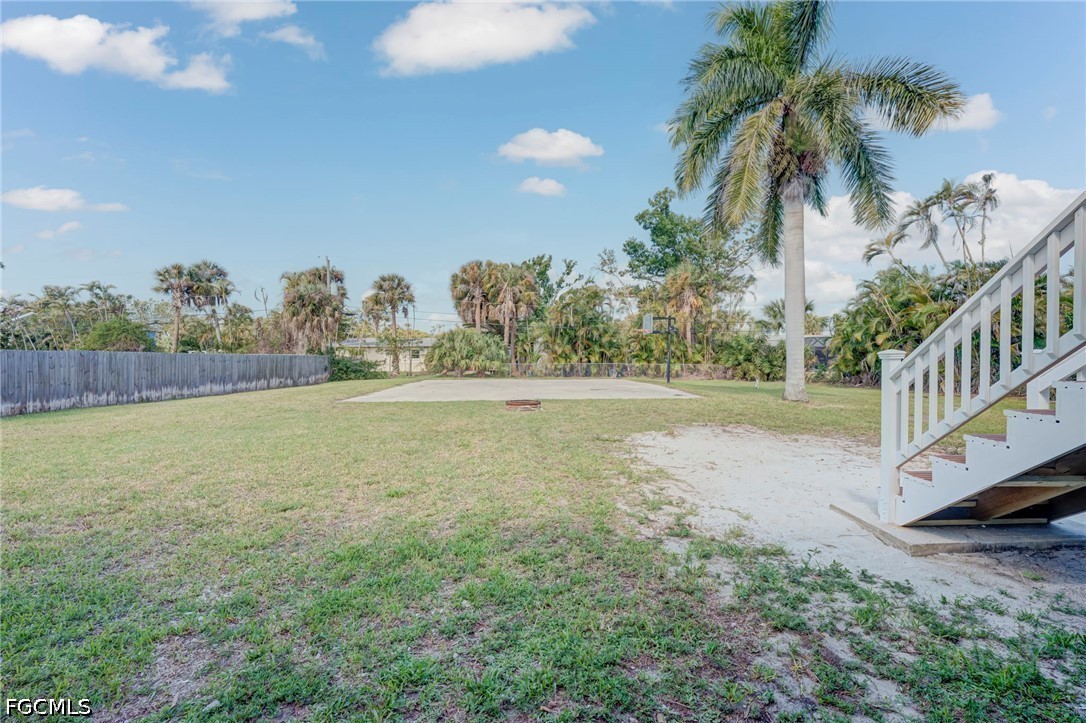 16380 Arbor Ridge Drive Fort Myers, FL 33908 - Photo 41 of 47 a view of an outdoor space and a yard
