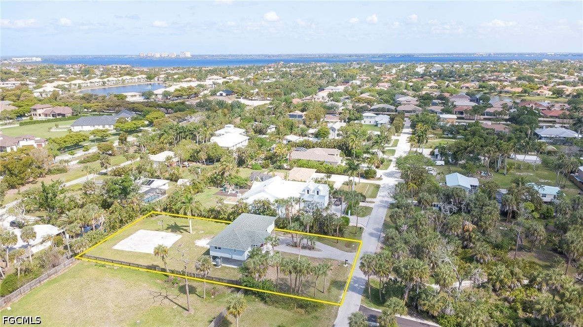 16380 Arbor Ridge Drive Fort Myers, FL 33908 - Photo 47 of 47 an aerial view of residential houses with outdoor space