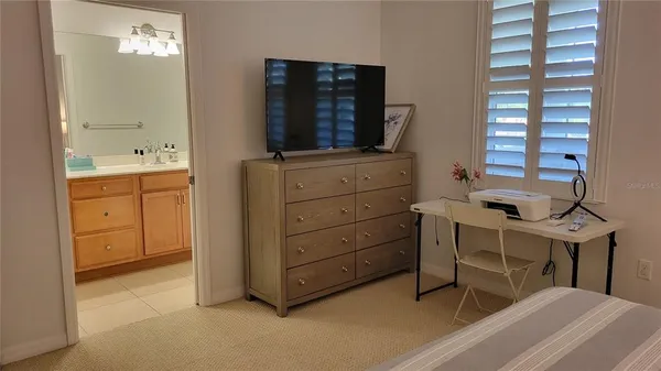 a room with a desk and chair
