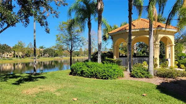 a view of a lake with a building in the background