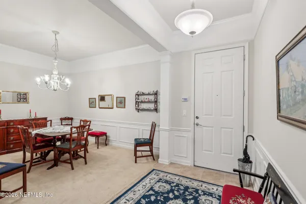 a view of a dining room with furniture
