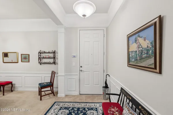 a room with furniture and a rug