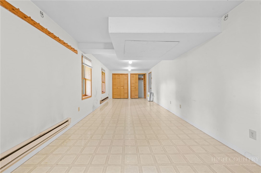 233 Alpine Acres Road Vilas, NC 28692 - Photo 21 of 32 a view of an empty room