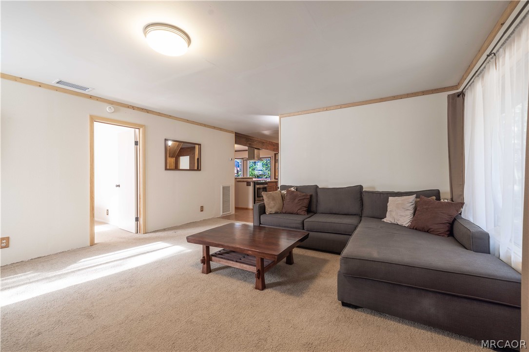 773 Sunset Lane Sugarloaf, CA 92386 - Photo 4 of 33 a living room with furniture and a window