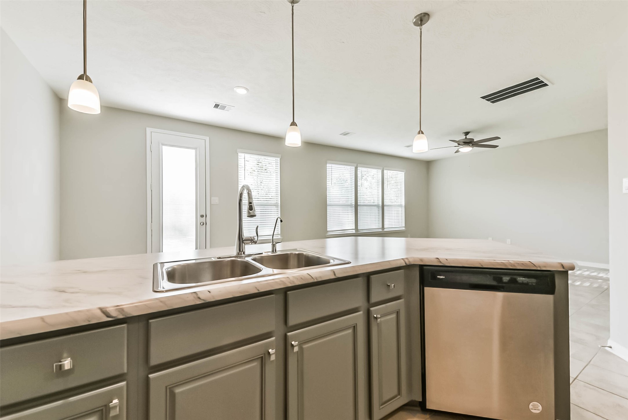 11626 Moonstruck Lane Houston, TX 77048 - Photo 12 of 35 a kitchen with a sink and cabinets