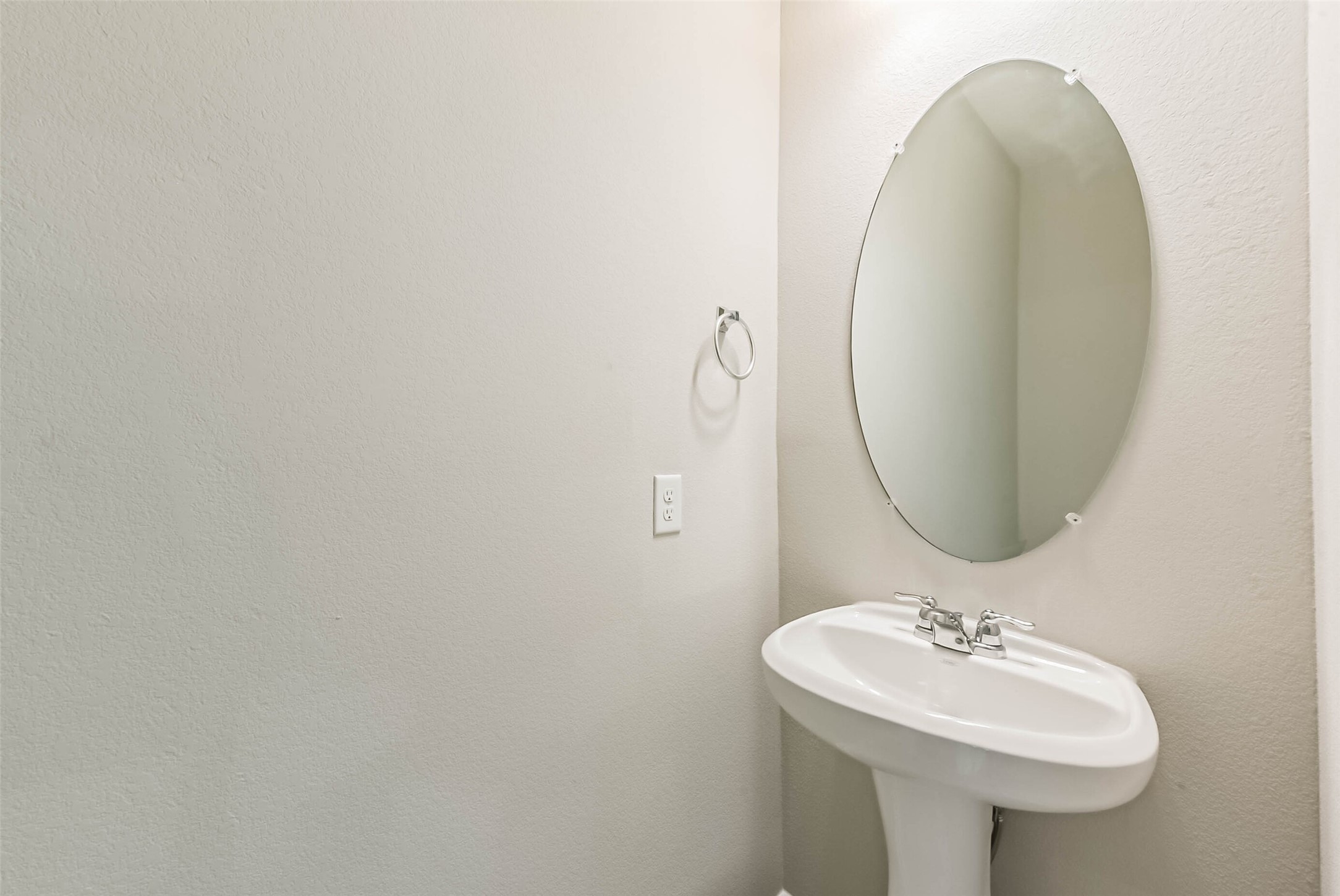 11626 Moonstruck Lane Houston, TX 77048 - Photo 16 of 35 a bathroom with a sink and a mirror