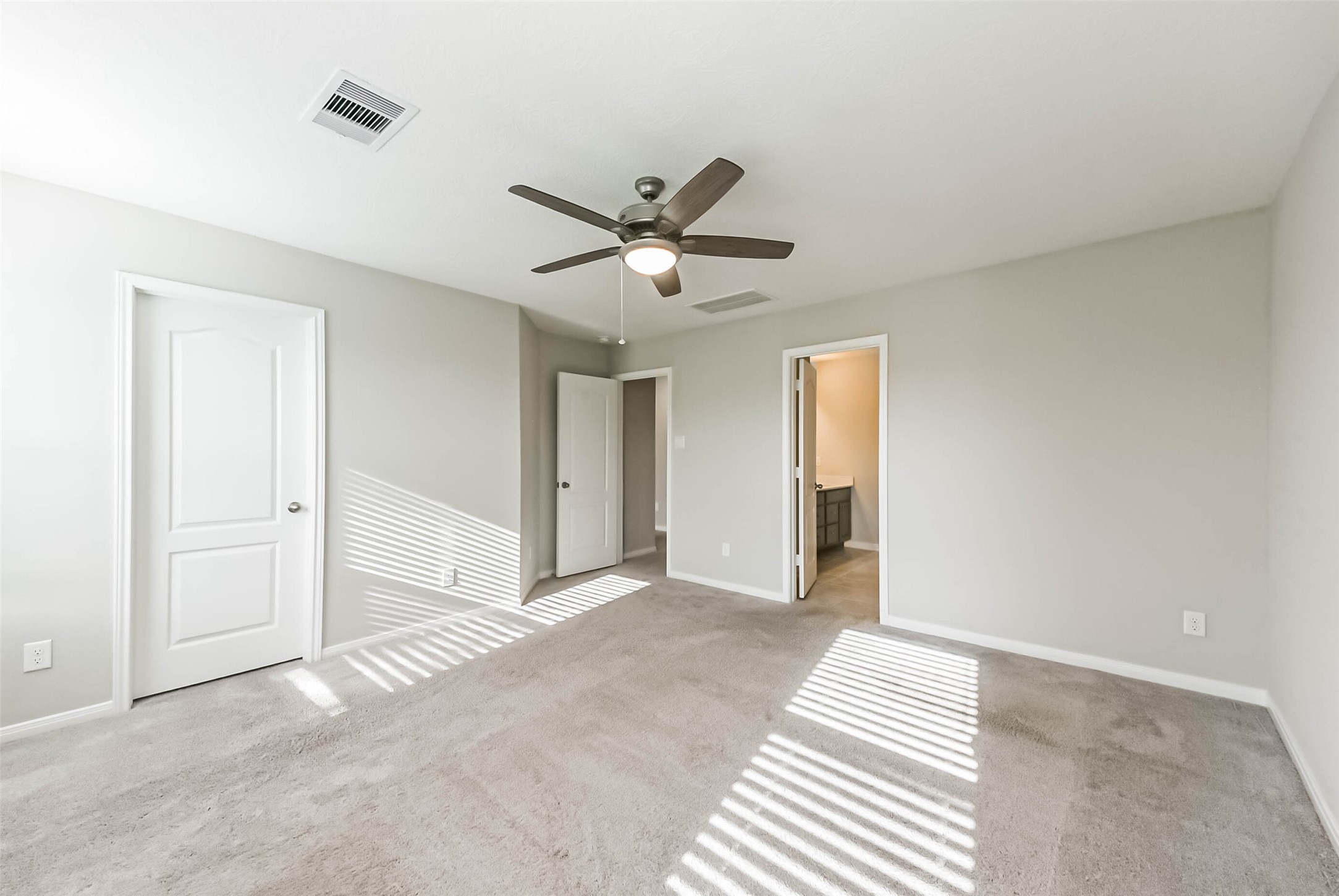 11626 Moonstruck Lane Houston, TX 77048 - Photo 21 of 35 a view of a livingroom with a ceiling fan and window
