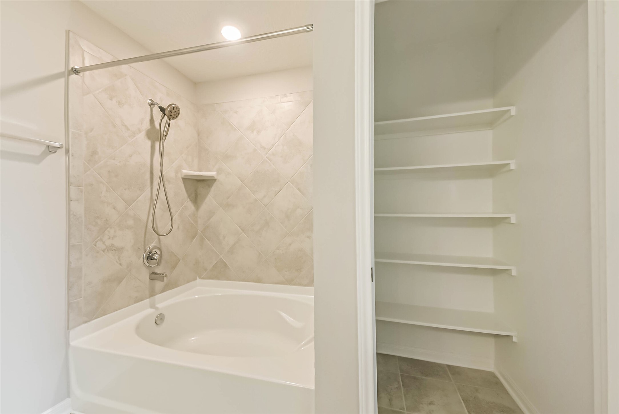 11626 Moonstruck Lane Houston, TX 77048 - Photo 25 of 35 a white bath tub with shower