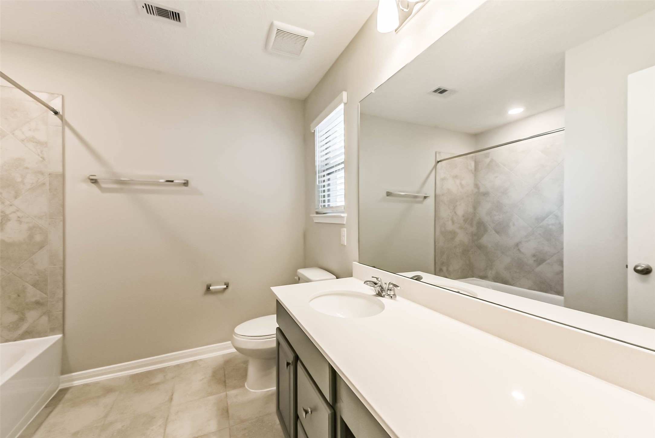 11626 Moonstruck Lane Houston, TX 77048 - Photo 30 of 35 a bathroom with a sink a toilet and shower
