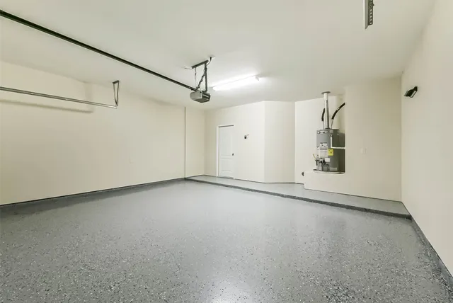 a view of a house with pool and sitting area