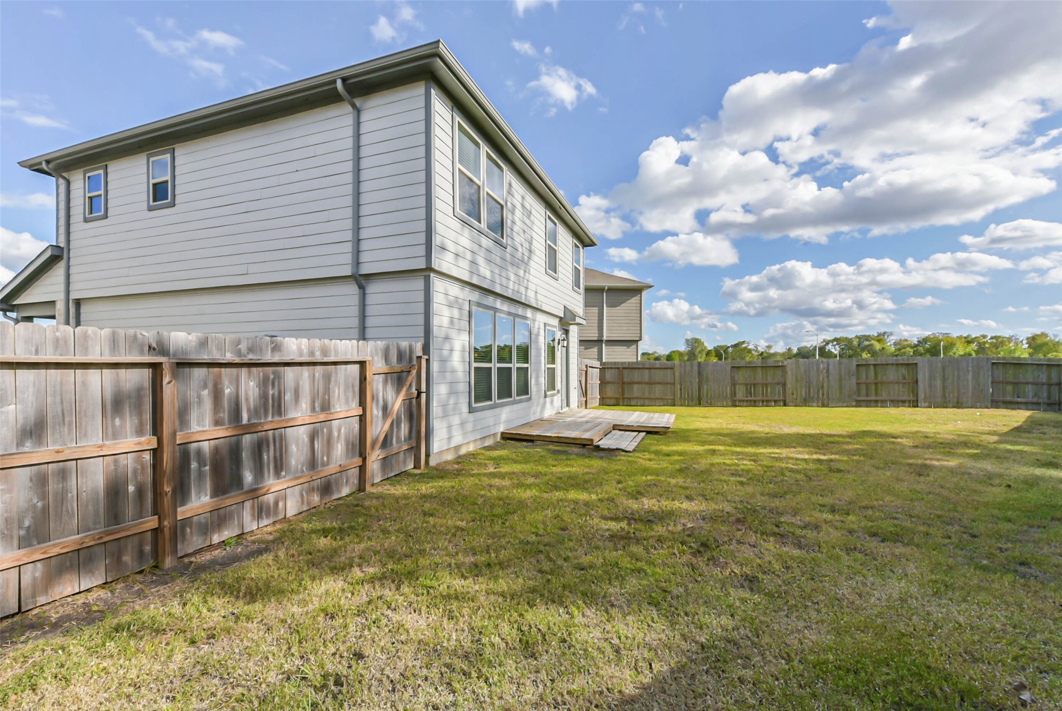 11626 Moonstruck Lane Houston, TX 77048 - Photo 35 of 35 a view of a house with a yard
