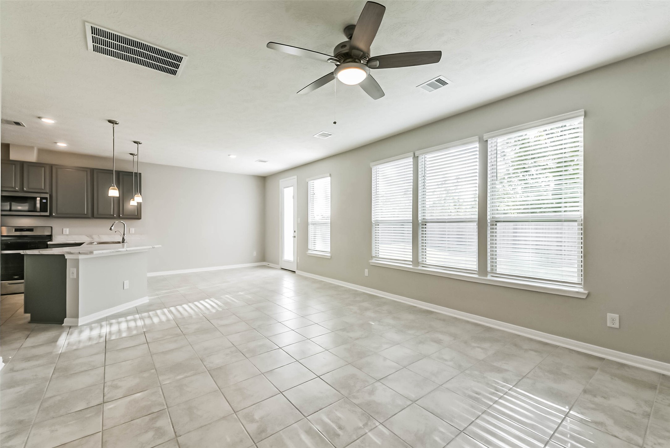 11626 Moonstruck Lane Houston, TX 77048 - Photo 5 of 35 a view of an empty room with a window