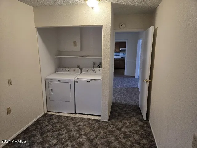 a view of a backyard of the house