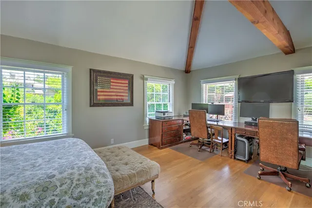 a workspace with furniture and a window