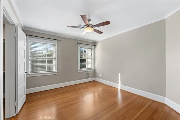 a bathroom with a shower sink and mirror