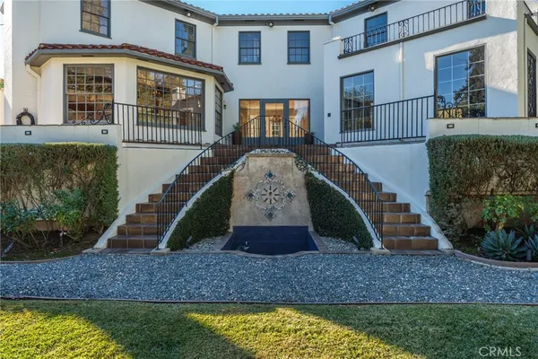 an aerial view of house with yard
