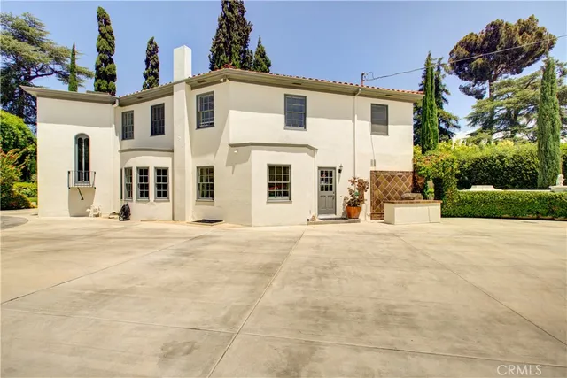 front view of a house with a road