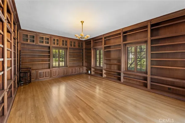 a view of a room with wooden floor and balcony