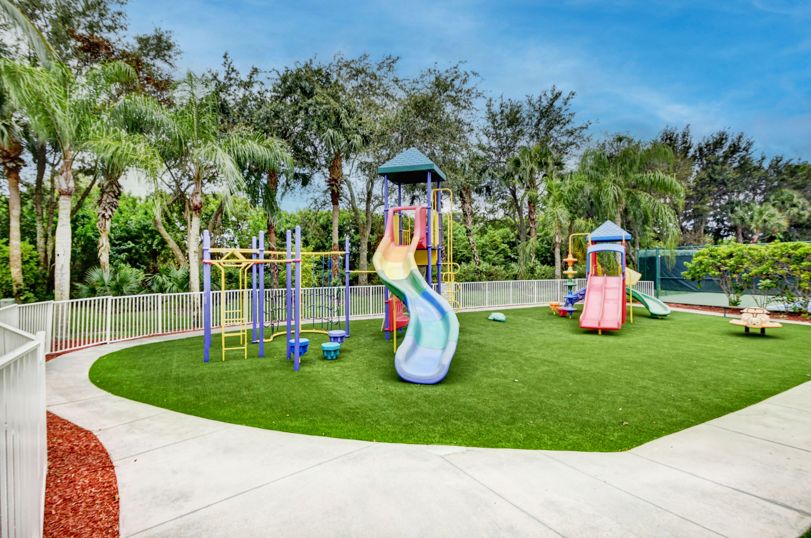 21048 Vía Eden Boca Raton, FL 33433 - Photo 33 of 53 a garden view with a swimming pool