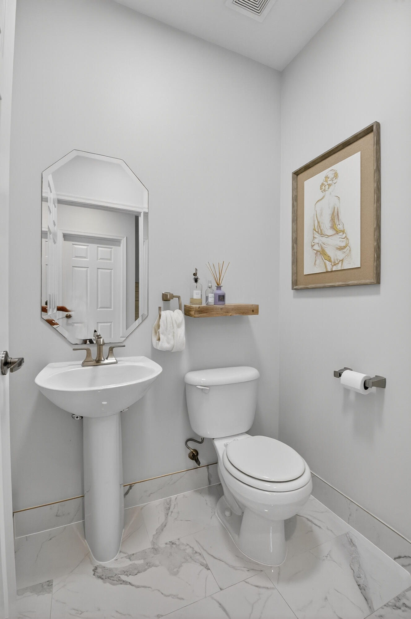 21048 Vía Eden Boca Raton, FL 33433 - Photo 9 of 53 a bathroom with a sink toilet and mirror