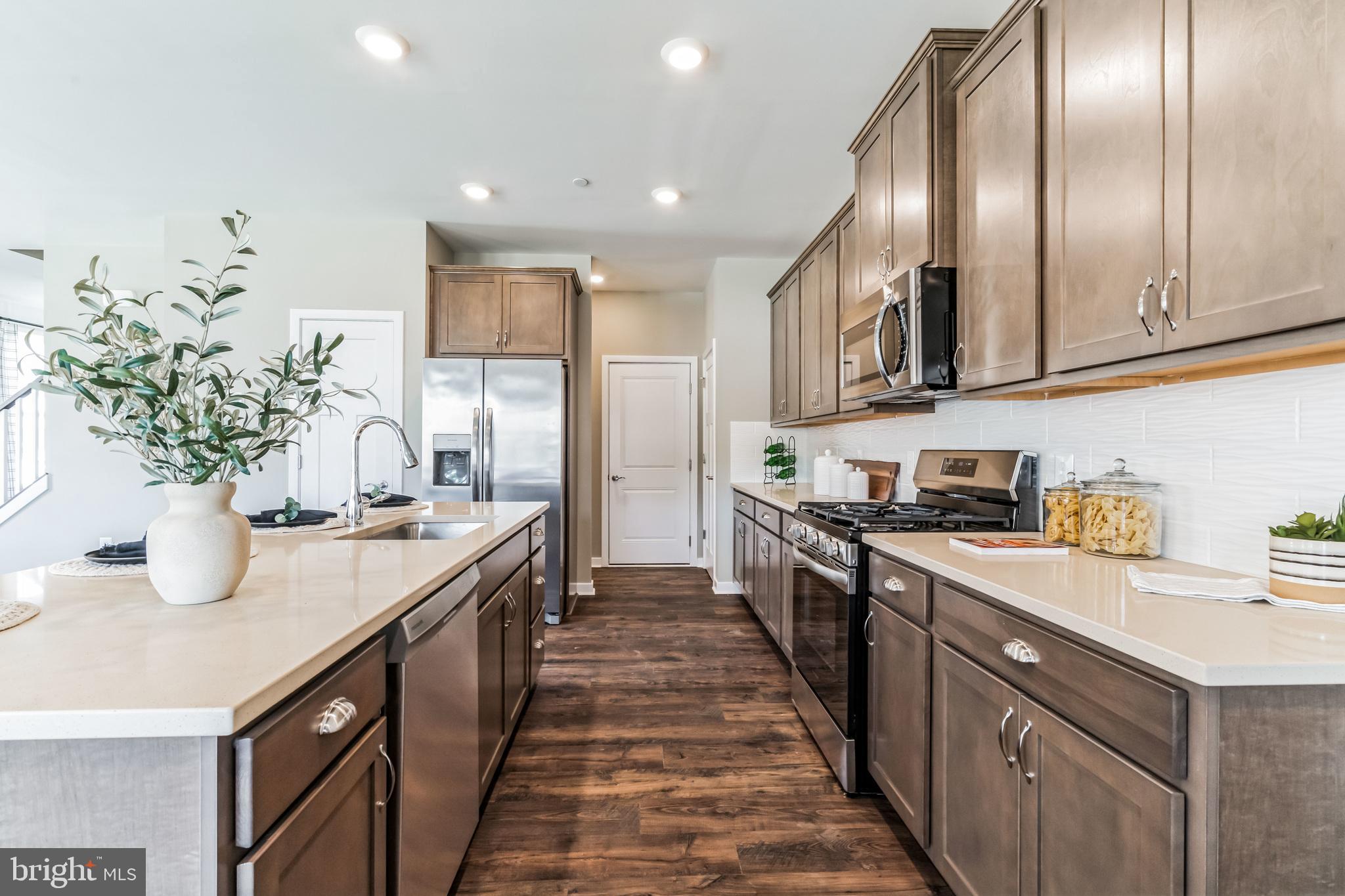 724 Aldora Drive, Unit 111SOPHIE Aberdeen, MD 21001 - Photo 25 of 42 a kitchen with granite countertop lots of counter top space