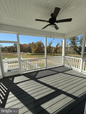 a view of wooden floor with a table