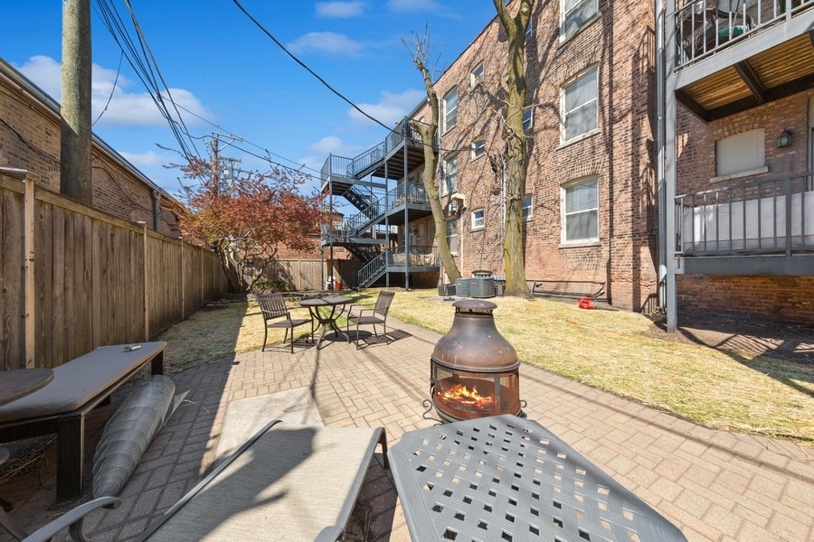3942 North Clarendon Avenue, Unit 1N Chicago, IL 60613 - Photo 13 of 13 a view of outdoor space yard deck and patio