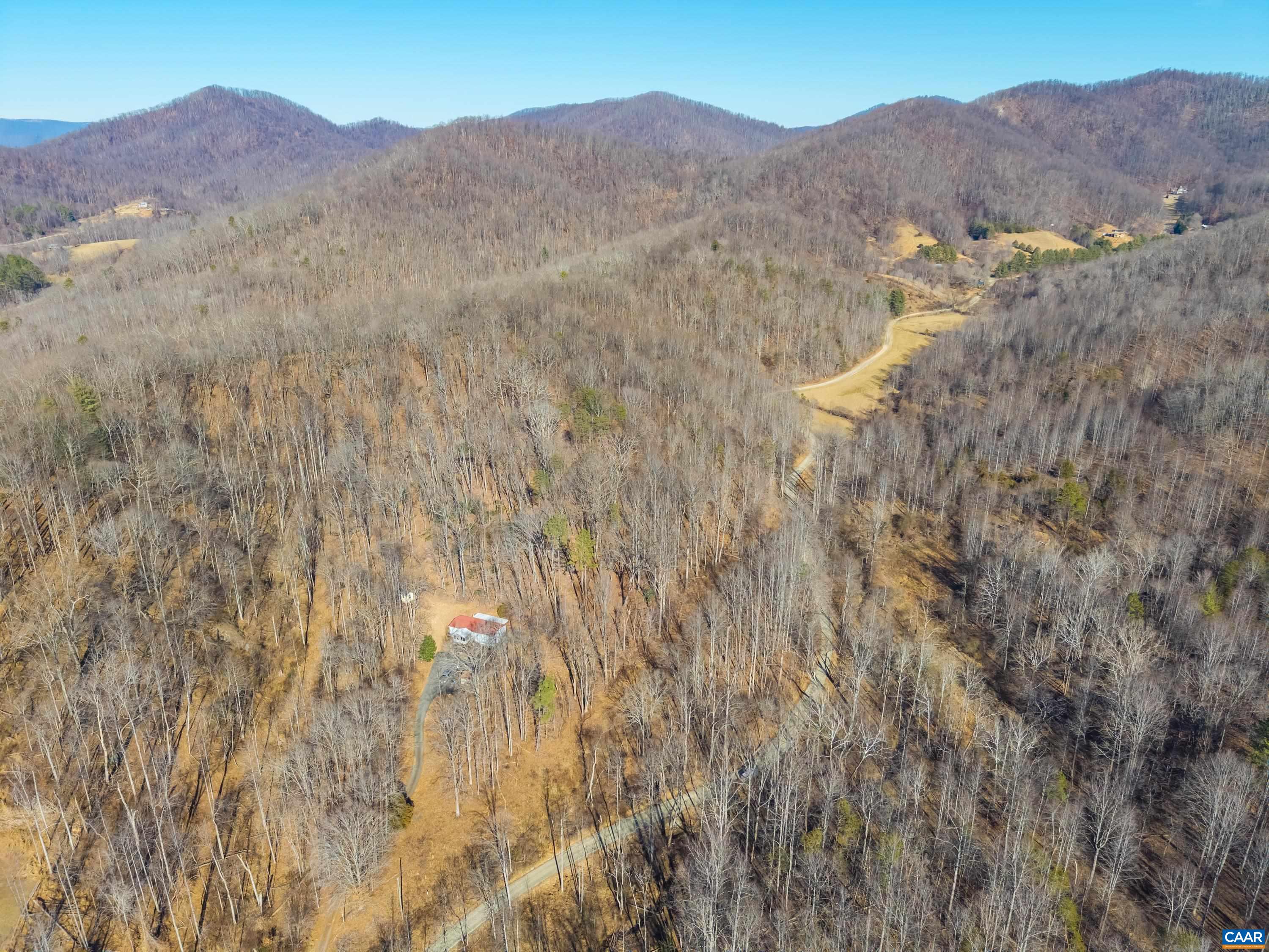 Perkins Hollow Lane Faber, VA 22938 - Photo 13 of 35 a view of a house with a mountain and a forest