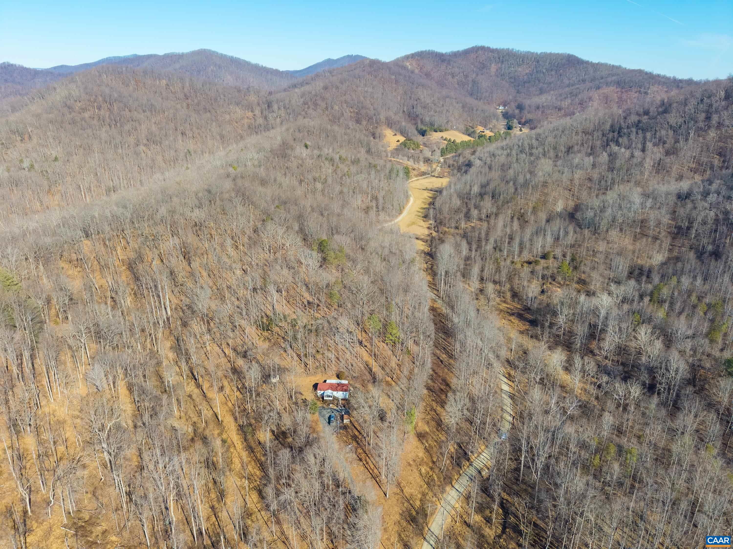Perkins Hollow Lane Faber, VA 22938 - Photo 14 of 35 a view of a house with a mountain and a forest