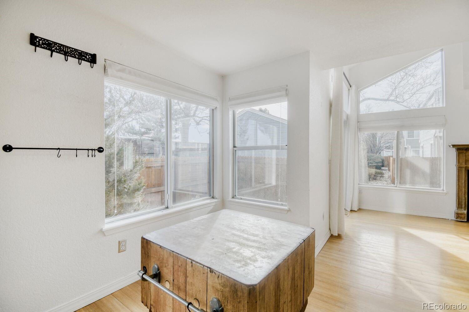 5174 Buckingham Road Boulder, CO 80301 - Photo 15 of 33 a view of kitchen island with wooden floor