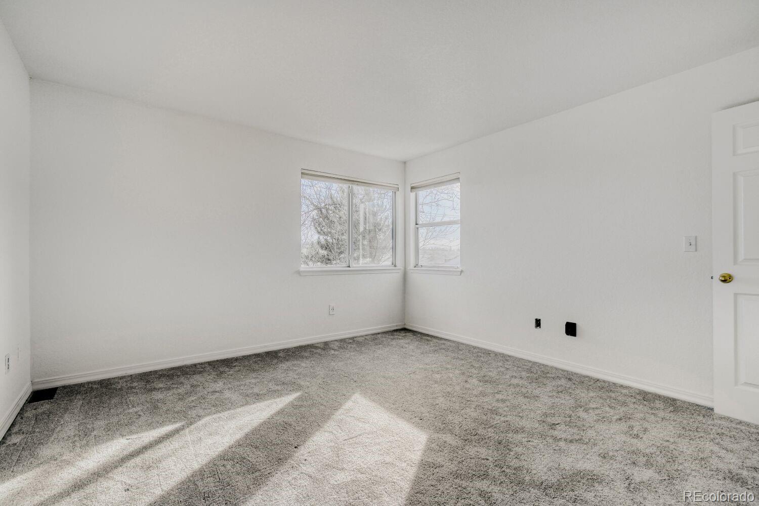 5174 Buckingham Road Boulder, CO 80301 - Photo 20 of 33 a view of an empty room with a window