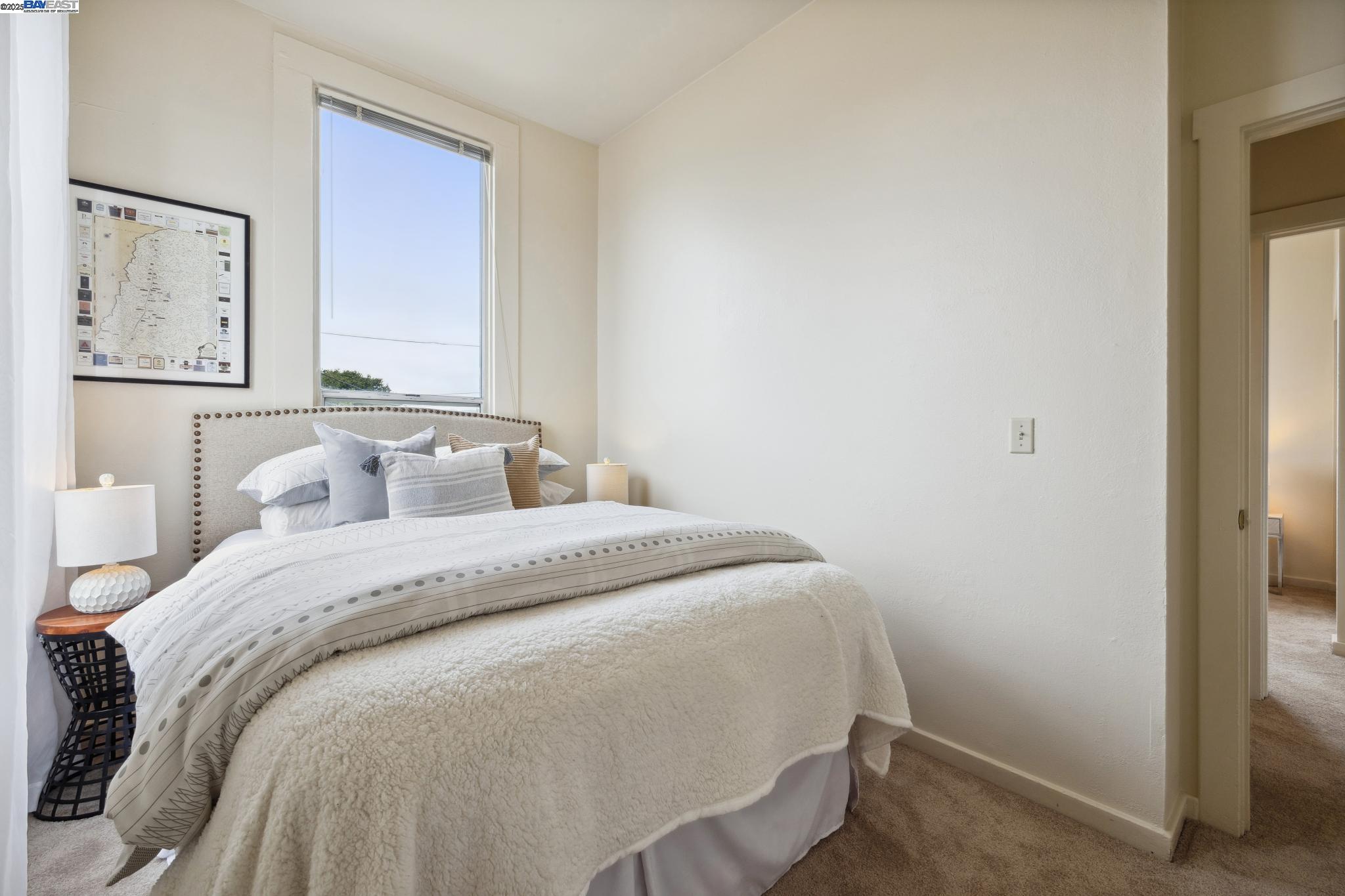 1820 3rd Street Alameda, CA 94501 - Photo 20 of 60 a bedroom with a bed and a window