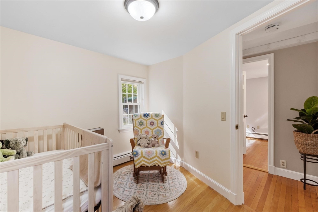 25 Naples Road Melrose, MA 02176 - Photo 18 of 36 a view of a livingroom with wooden floor