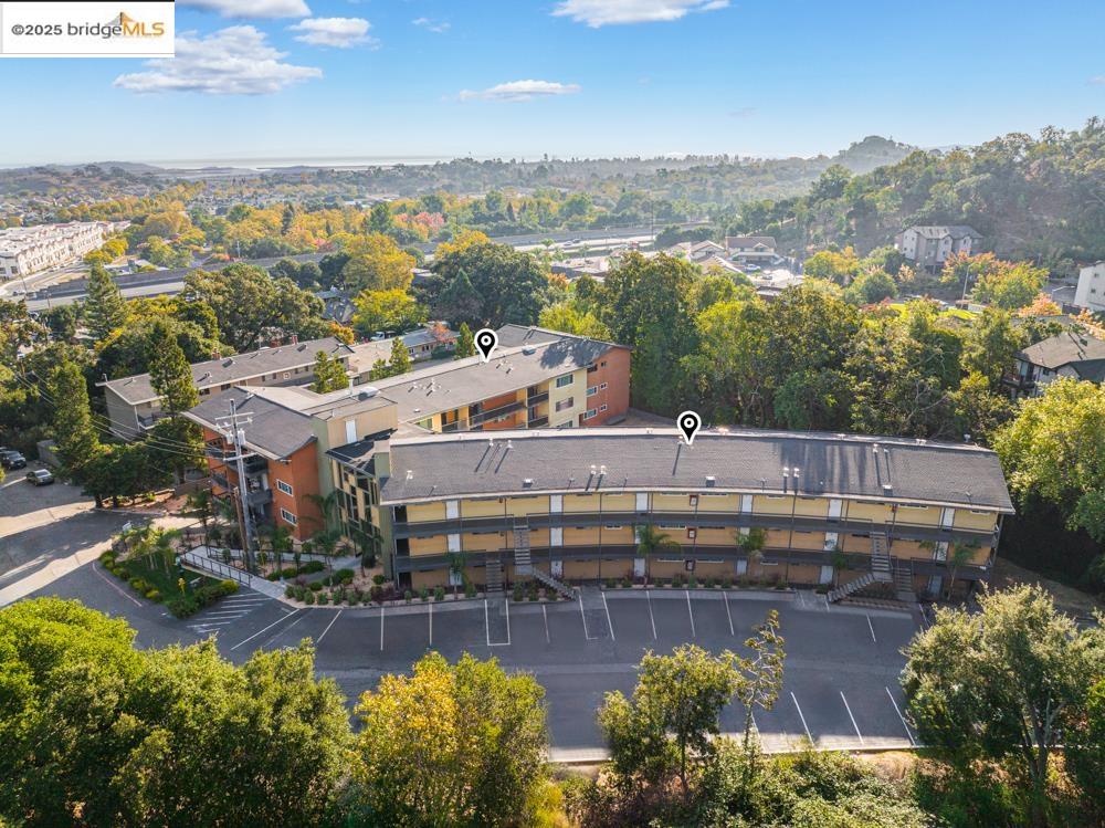 an aerial view of a house with a lake view
