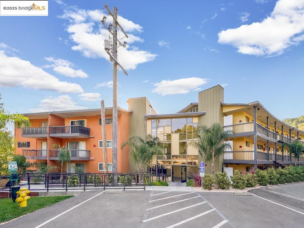 195 Los Robles Road Novato, CA 94949 - Photo 17 of 26 a city street lined with tall buildings