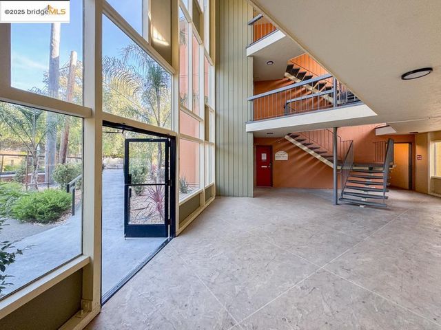 a front view of a building with street view