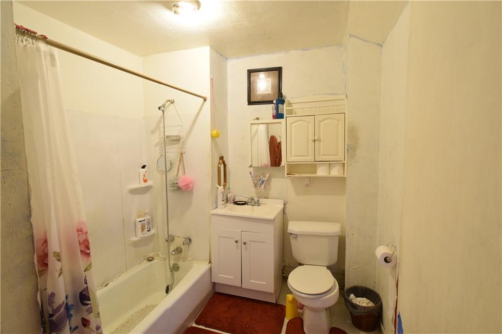 376 Ellsworth Street Sharon, PA 16146 - Photo 10 of 10 a bathroom with a sink toilet and shower