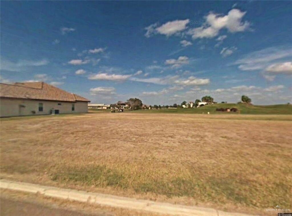 1310 Tierra Santa Weslaco, TX 78596 - Photo 1 of 1 a view of a large body of water with a building in the background