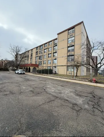 a view of large building with a road