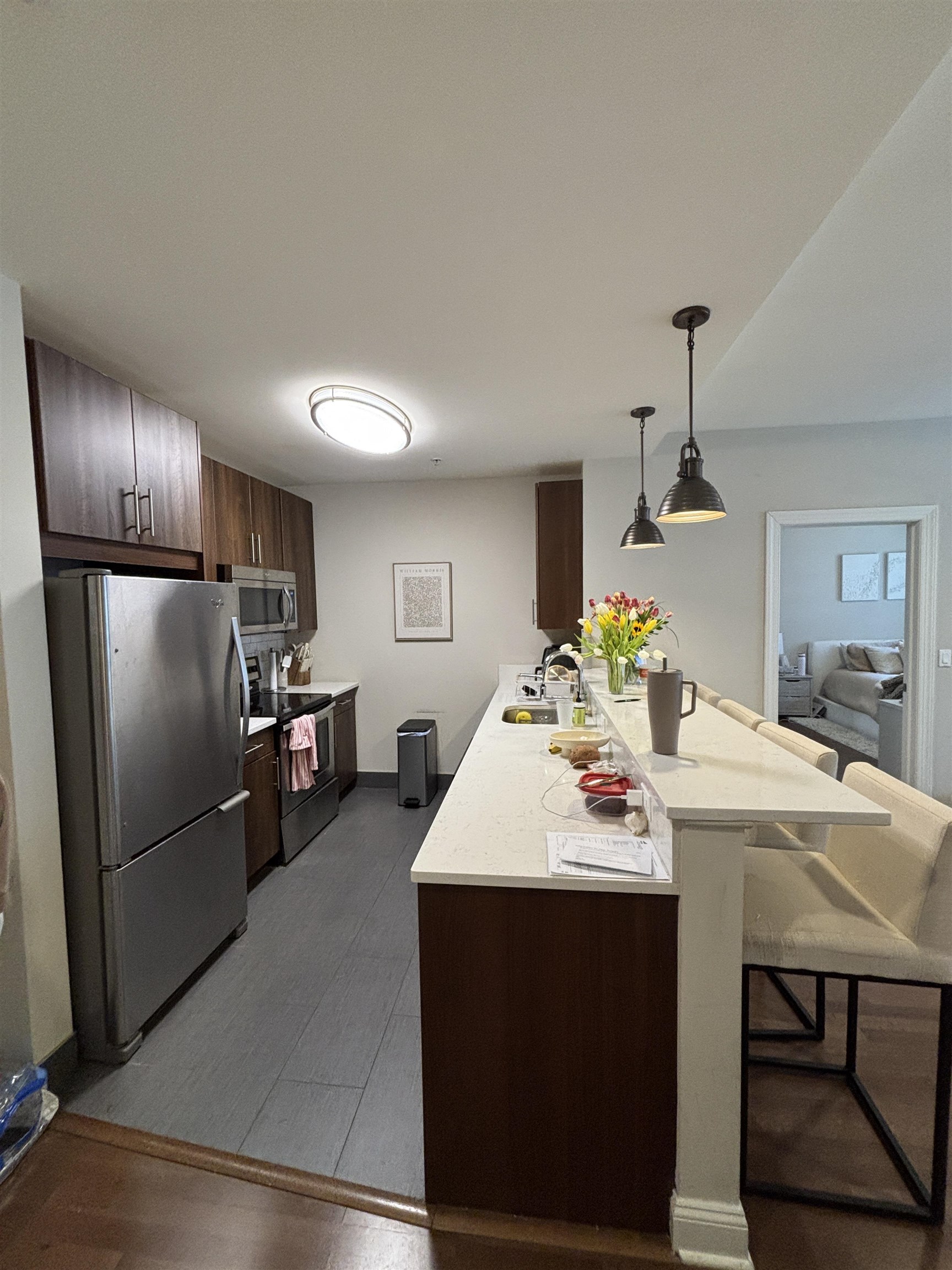 100 Marshall Street, Unit 316 Hoboken, NJ 07030 - Photo 1 of 9 a kitchen view with appliances a sink and refrigerator