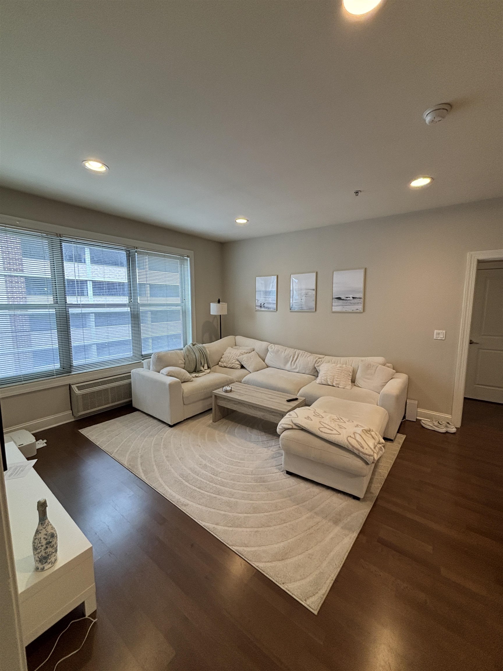 100 Marshall Street, Unit 316 Hoboken, NJ 07030 - Photo 2 of 9 a bedroom with furniture and a large window